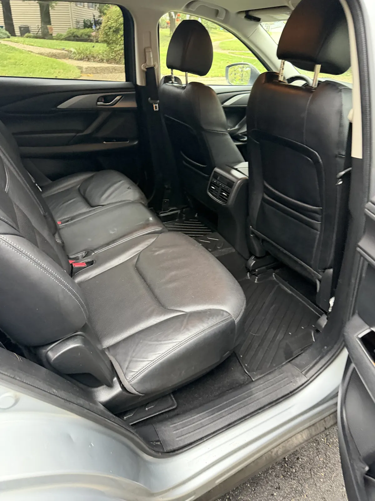 Same SUV rear rows after AMD pet hair removal and interior detail in Louisville