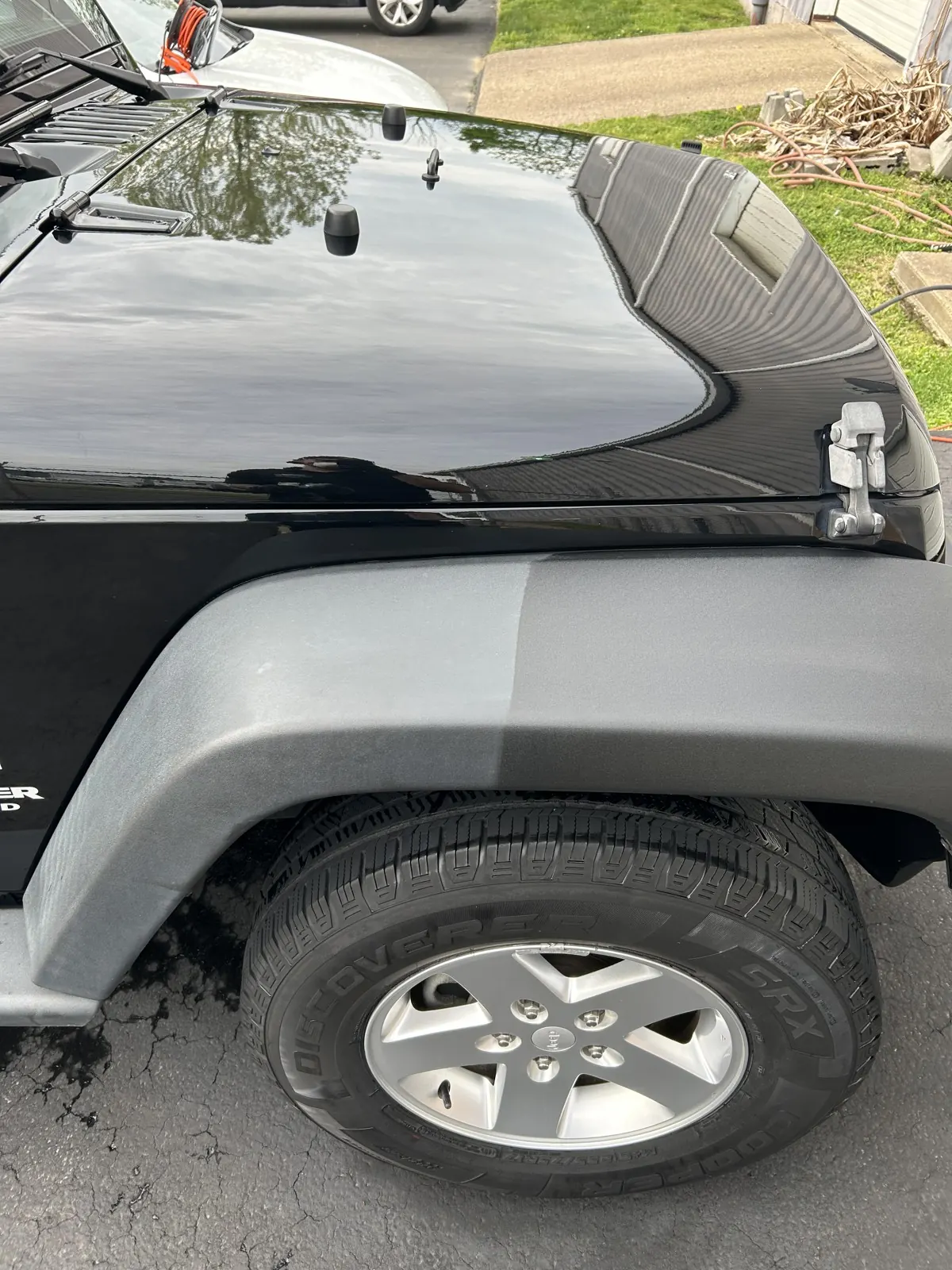 Jeep black plastic trim after AMD detailing in Louisville